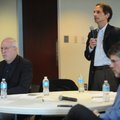 Tom Petrizzo, CEO of Ozark Guidance Center in Springdale, center, speaks alongside Rob Gershon, chie...