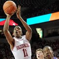 NWA Media/MICHAEL WOODS --12/29/2012-- University of Arkansas guard BJ Young drives to the hoop past...