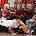 Kikko Haydar, an Arkansas junior, fights to keep a ball inbounds against Florida A&M in the first ha...