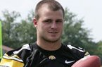 Coffeyville (Kan.) Community College quarterback A.J. Derby has agreed to walk on at Arkansas and compete for the starting job in the spring.