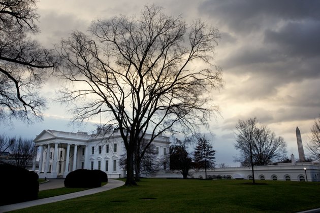 clouds-roil-over-the-white-house-in-washington-on-the-morning-of-sunday-dec-30-2012-as-washington-has-less-than-48-hours-to-avert-the-fiscal-cliff-a-series-of-tax-increases-and-spending-cuts-set-to-take-hold-on-jan-1-republican-and-democratic-negotiators-in-the-senate-were-hoping-to-reach-a-deal-to-avoid-going-over-the-cliff-on-sunday