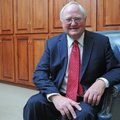 Jim Rollins, Springdale Public Schools superintendent, smiles Dec. 21 in his office at 804 W. Johnso...