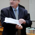 Jeff Harper works in court Friday during his last day as Springdale’s city attorney. 