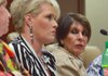 State Treasurer Martha Shoffner (right) looks at Autumn Sanson, Chief Investments Officer, as Sanson pauses after asking the Legislative Joint Auditing Committee for the second time if her answers would be covered by the Whistleblower Protection Act during a meeting of the committee last September. 