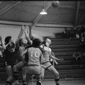 Six players battle for a rebound at one end of the court in this photo taken at the West Fork Tourna...