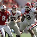 Georgia running back Todd Gurley (3) runs for a 24-yard touchdown past the Nebraska defense during t...