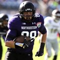 Northwestern defensive lineman Quentin Williams (88) returns a interception for a touchdown during t...
