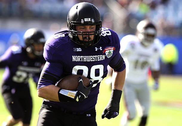 northwestern-defensive-lineman-quentin-williams-88-returns-a-interception-for-a-touchdown-during-the-first-half-of-the-gator-bowl-ncaa-college-football-game-against-mississippi-state-tuesday-jan-1-2013-in-jacksonville-fla-ap-photostephen-morton