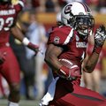 South Carolina's Ace Sanders (1) runs back a punt 63-yards for a touchdown against Michigan during t...