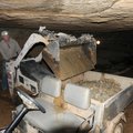 Steve Turner, a commercial cave expert from Tennessee, removes loose rock from War Eagle Cavern on N...
