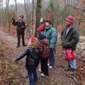 Rachel Diersen, left, interpretive naturalist at Hobbs State Park-Conservation Area, leads a New Yea...