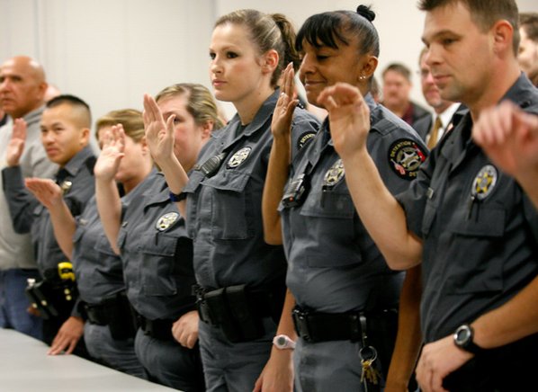 Deputies are sworn in by ...