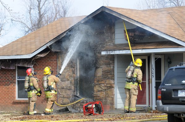 Springdale firefighters hose down the ...
