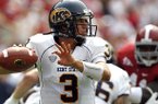 Kent State quarterback Spencer Keith (3) looks to throw against Alabama during the first half of an NCAA college football game on Saturday, Sept. 3, 2011 in Tuscaloosa, Ala. (AP Photo/Butch Dill)