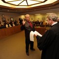 Washington County Tax Collector David Ruff, center, is sworn in Wednesday by Washington County Circu...