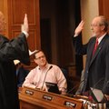 Fayetteville Mayor Lioneld Jordan, right, is sworn in Thursday by Judge Rudy Moore before the start ...