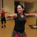 Lilia Gamez, center, leads a Zumba class Thursday during a lively tune at the Adult Wellness Center ...