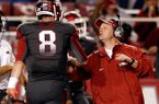 Tim Horton (right) was hired as Auburn's tight ends coach on Friday after spending six seasons at Arkansas.