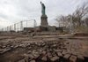 Parts of the brick walkway of Liberty Island were damaged in Hurricane Sandy. Two months after the storm, authorities have no estimate on when the island will reopen. 