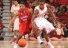 Arkansas guard Mardracus Wade knocks the ball away from Delaware State guard Chris Lewis (34) Saturday, Jan. 5, 2013, during the second half of play in Bud Walton Arena in Fayetteville.