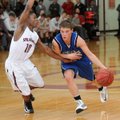 Keifer Holt, right, of Rogers High drives around Treshawn Gause of Springdale High during the second...