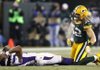 Minnesota quarterback Joe Webb reacts after throwing an incomplete pass and getting hit by Green Bay outside linebacker Clay Matthews (52) during the second half of the Vikings’ 24-10 loss to the Packers on Saturday in Green Bay, Wis. 