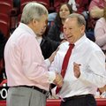 “It’s a grind in the SEC,” Arkansas women’s Coach Tom Collen (right, shown with Texas A&M Coach Gary...