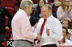 “It’s a grind in the SEC,” Arkansas women’s Coach Tom Collen (right, shown with Texas A&M Coach Gary Blair) said Monday at the Downtown Tip-Off Club.