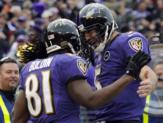 baltimore-ravens-wide-receiver-anquan-boldin-81-celebrates-his-touchdown-catch-with-quarterback-joe-flacco-5-during-the-second-half-of-an-nfl-wild-card-playoff-football-game-against-the-indianapolis-colts-sunday-jan-6-2013-in-baltimore