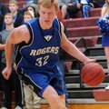 Zach Jones, Rogers High, drives into the key Friday during the second half against Springdale High S...