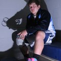 Ty Harrison of Springdale Har-Ber sits on the bleachers Friday in the main gym during the final matc...