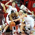 Arkansas center Sarah Watkins (top) and guard Calli Berna put pressure on Texas A&M center Kelsey Bo...