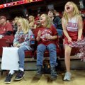  Kora Jagger, 9, from left, Kayla Jagger, 9, and Taci McCoy, 7, all of Rogers, yell as they try to m...