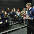 Wiley Bailey, National Vice President for the Future Farmers of America, breaks out his banjo during...