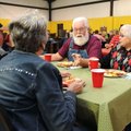 Sherman Treat, center, talks with Glen Odglen, from left, Swen Odglen and Gerene Treat during ostomy...