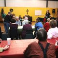 Tena Reese addresses fellow ostomy patients and family members during the a meeting in December. 
