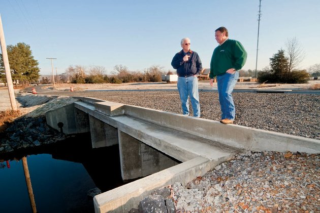 vilonia-city-engineer-fred-fowlkes-left-and-mayor-james-firestone-look-over-the-new-bridge-on-north-church-street-in-vilonia-the-bridge-replaced-a-single-lane-bridge-that-caused-traffic-flow-issues