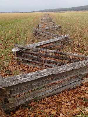 Split-rail fences add to the Civil War atmosphere at Pea Ridge National Military Park.