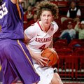 NWA Media/JASON IVESTER -- Arkansas senior Sarah Watkins works around LSU junior Theresa Plaisance d...