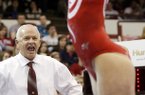 Mark Cook will begin his 11th season as Arkansas' co-head coach on Friday.