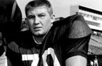 Loyd Phillips, who lettered at Arkansas in the 1960s, will receive the Outland Trophy on Thursday.