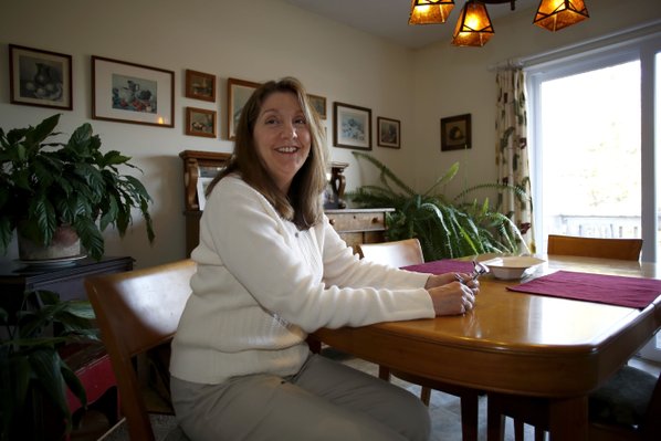 Carolyn Reno sits in her ...