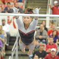 NWA Media/ANDY SHUPE -- Arkansas freshman Heather Elswick competes on the bars during a meet with Ge...