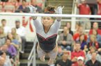 NWA Media/ANDY SHUPE -- Arkansas freshman Heather Elswick competes on the bars during a meet with Georgia Friday, Jan. 11, 2013 at Barnhill Arena in Fayetteville.