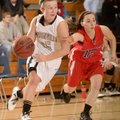 Bentonville’s Deanna Adkins, left, shown driving past East Newton (Mo.) defender Shelbey Thomlinson ...