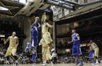 Kentucky forward Nerlens Noel (3) shoots against Vanderbilt forward Sheldon Jeter, center, in the second half of an NCAA college basketball game on Thursday, Jan. 10, 2013, in Nashville, Tenn. Kentucky won 60-58. (AP Photo/Mark Humphrey)
