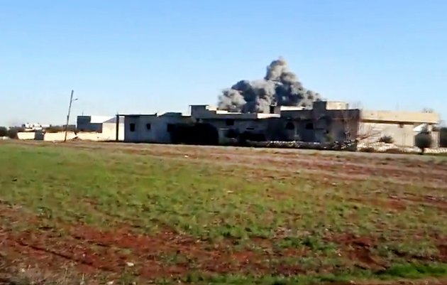 in-this-thursday-jan-10-2013-file-image-taken-from-video-obtained-from-the-shaam-news-network-which-has-been-authenticated-based-on-its-contents-and-other-ap-reporting-smoke-rises-due-to-heavy-shelling-in-taftanaz-idlib-province-northern-syria-syrian-rebels-and-islamic-militants-seeking-to-topple-president-bashar-assad-took-full-control-of-the-taftanaz-air-base-friday-jan-11-in-a-significant-blow-to-government-forces-seizing-helicopters-tanks-and-multiple-rocket-launchers-activists-said