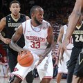 NWA MEDIA/SAMANTHA BAKER -- Arkansas' Marshawn Powell drives into Vanderbilt's defense Saturday, Jan...
