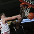 NWA MEDIA/SAMANTHA BAKER -- Arkansas' Hunter Mickelson, left, knocks the ball away from James Siakam...