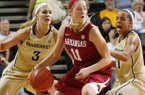 Calli Berna is double-teamed during the Razorbacks' 78-58 loss to Vanderbilt on Sunday at Memorial Gym in Nashville, Tenn.